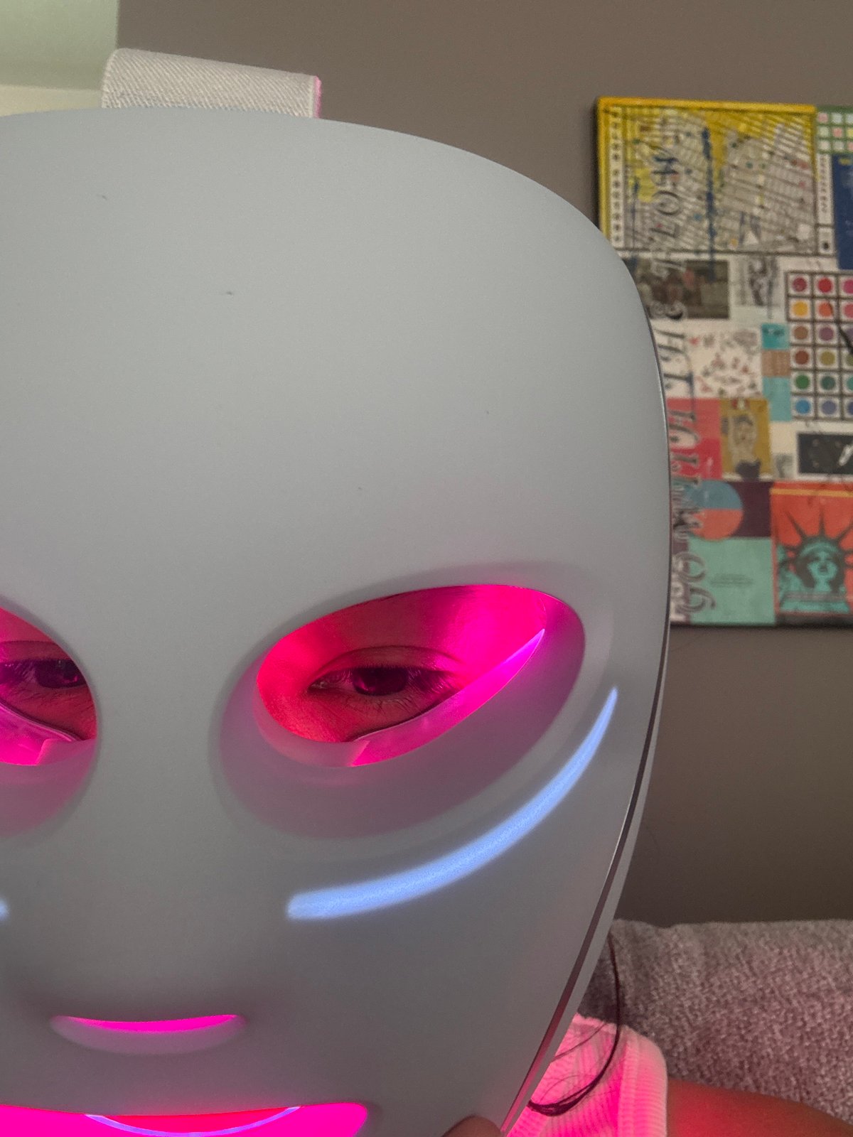 Person uses LED light therapy facial mask in Mexico