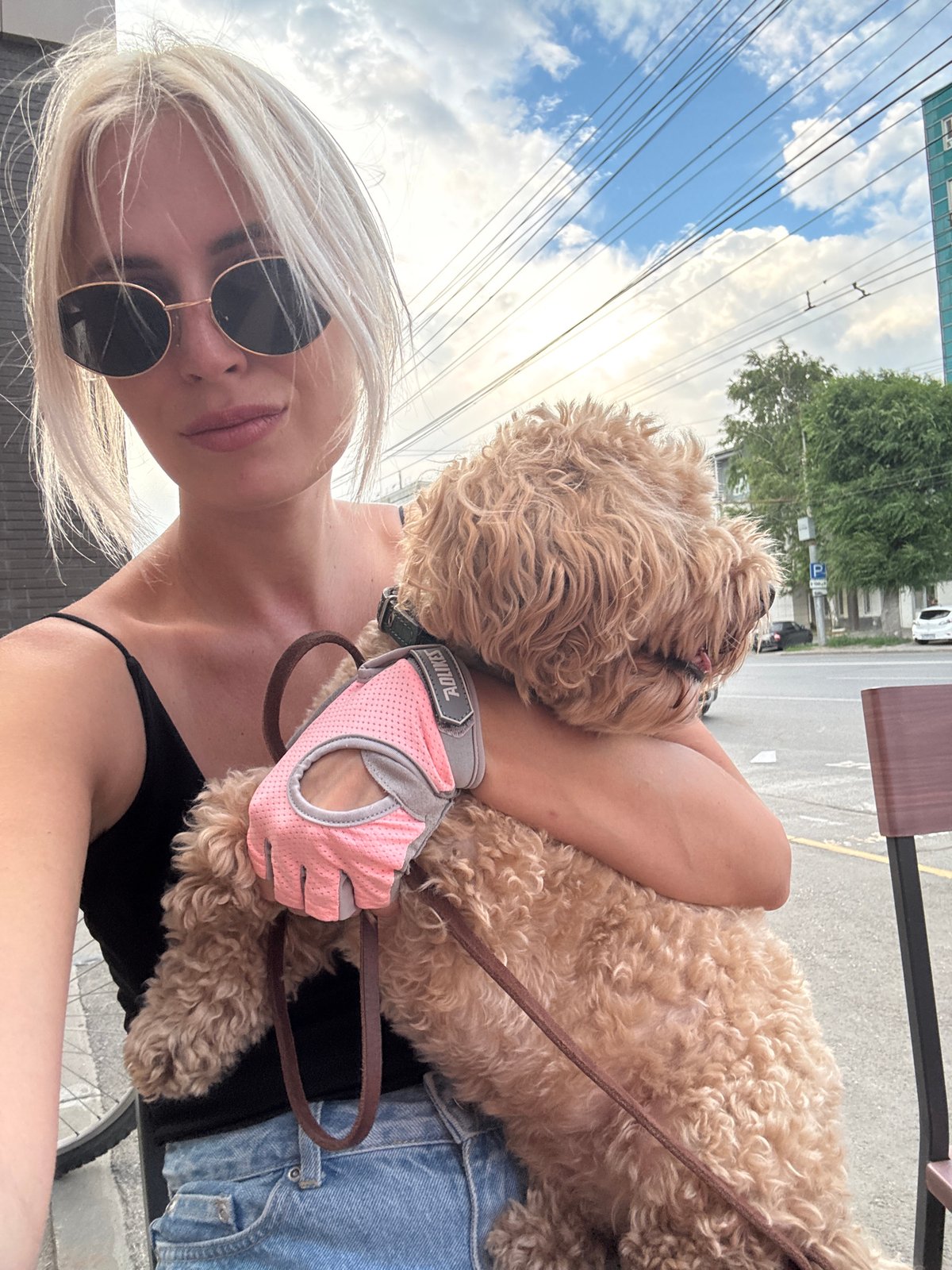 Selfie session with a curly-haired dog in Saratov