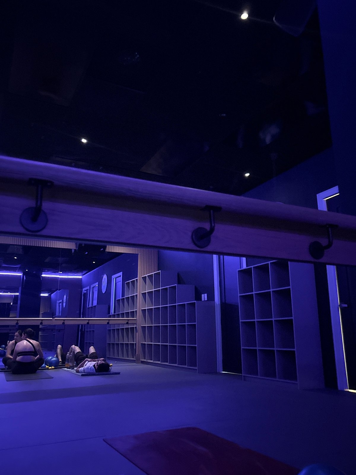 Mexico City fitness studio captured in atmospheric purple lighting