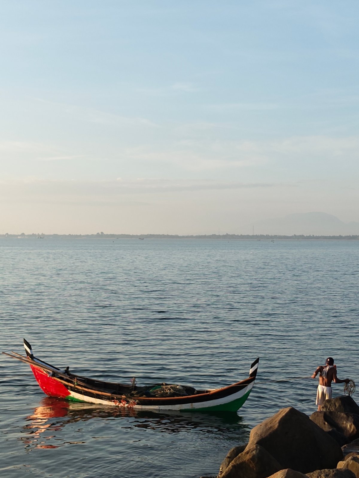 Fishing boats moored along the Lhokseumawe coastline