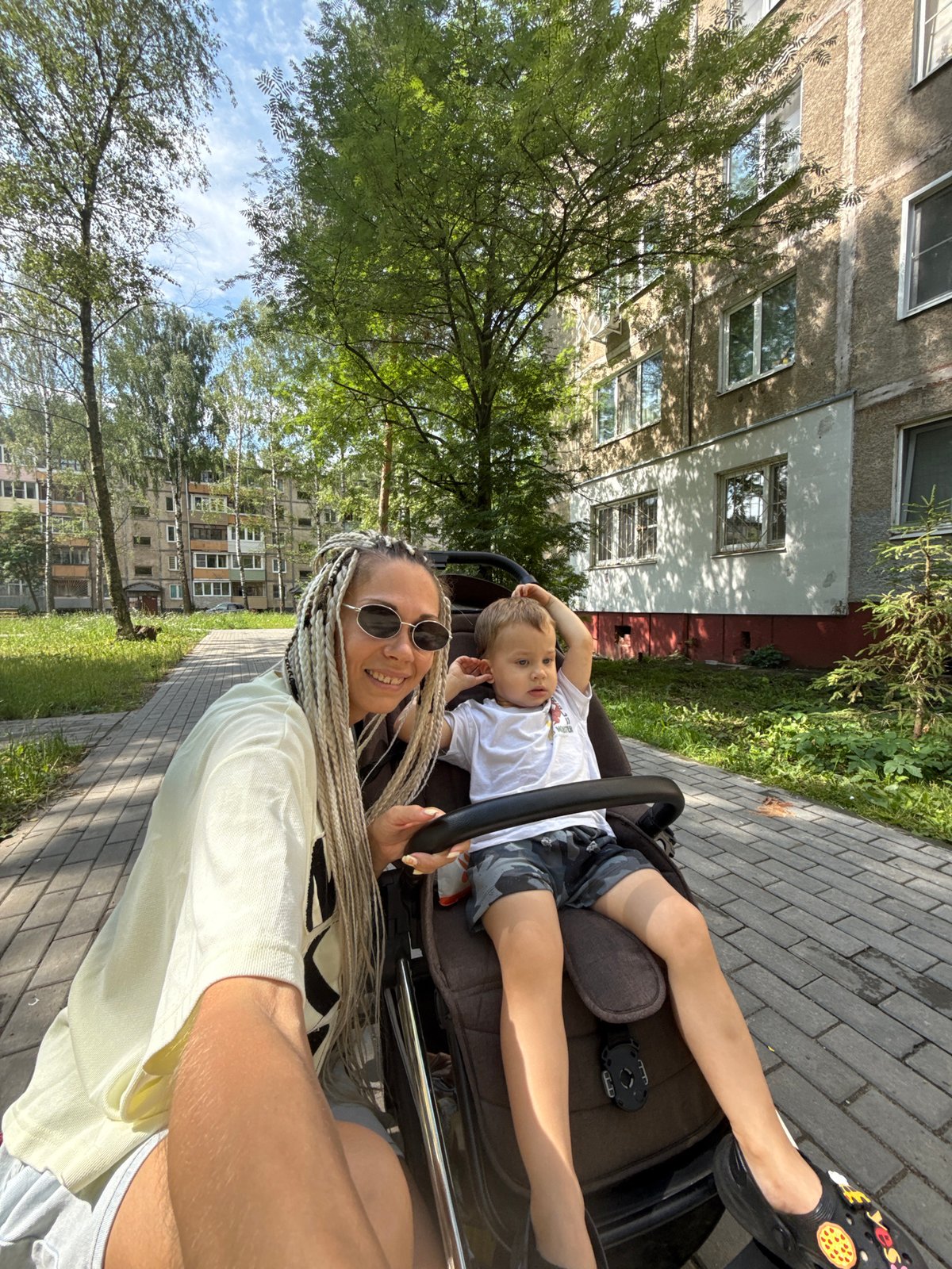 Summer morning stroll around a cube art installation in Rusanovo