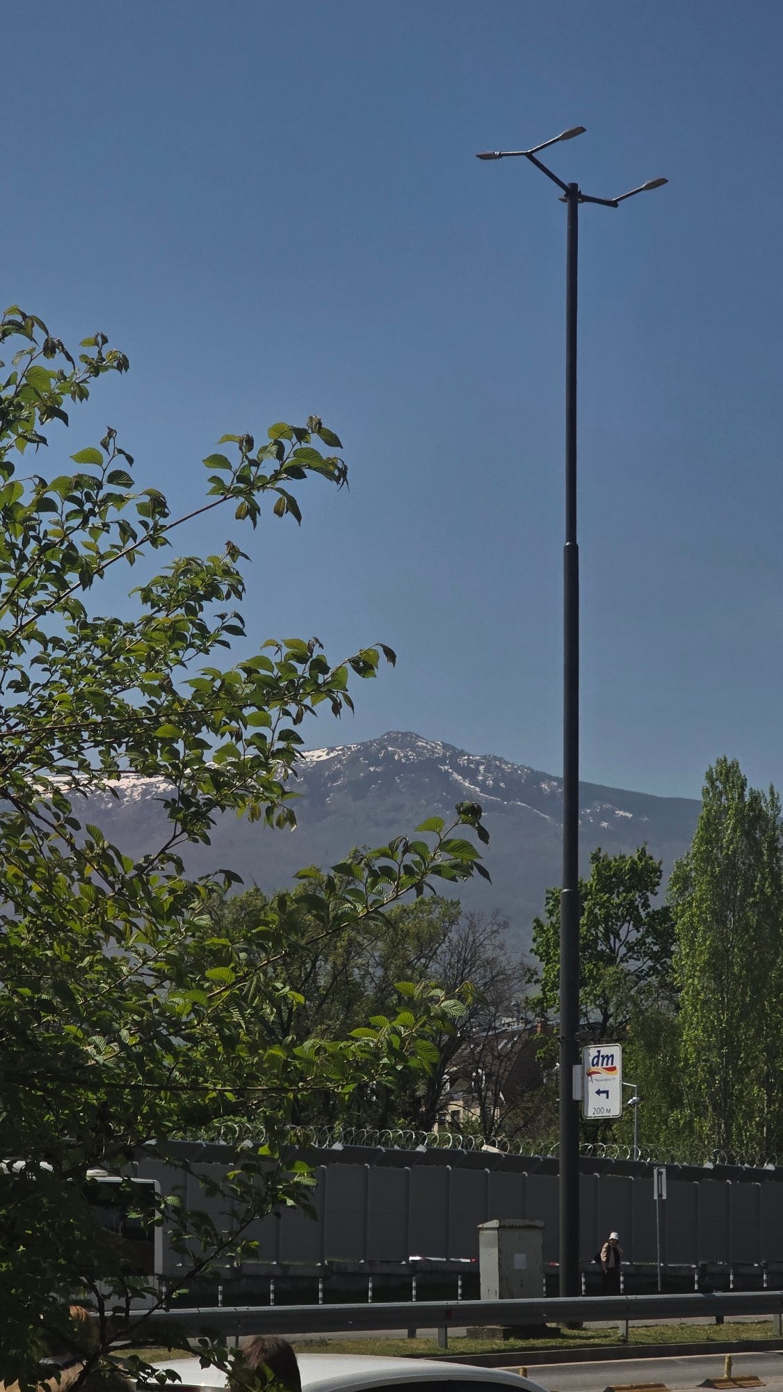 Street lamppost documented in bright morning scene, Sofia