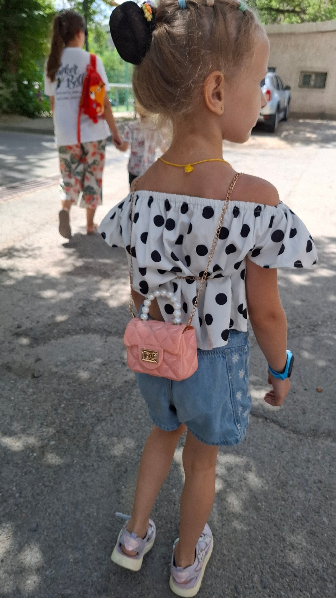 Morning in a Shymkent park: paths, courts, flowers, and quiet details