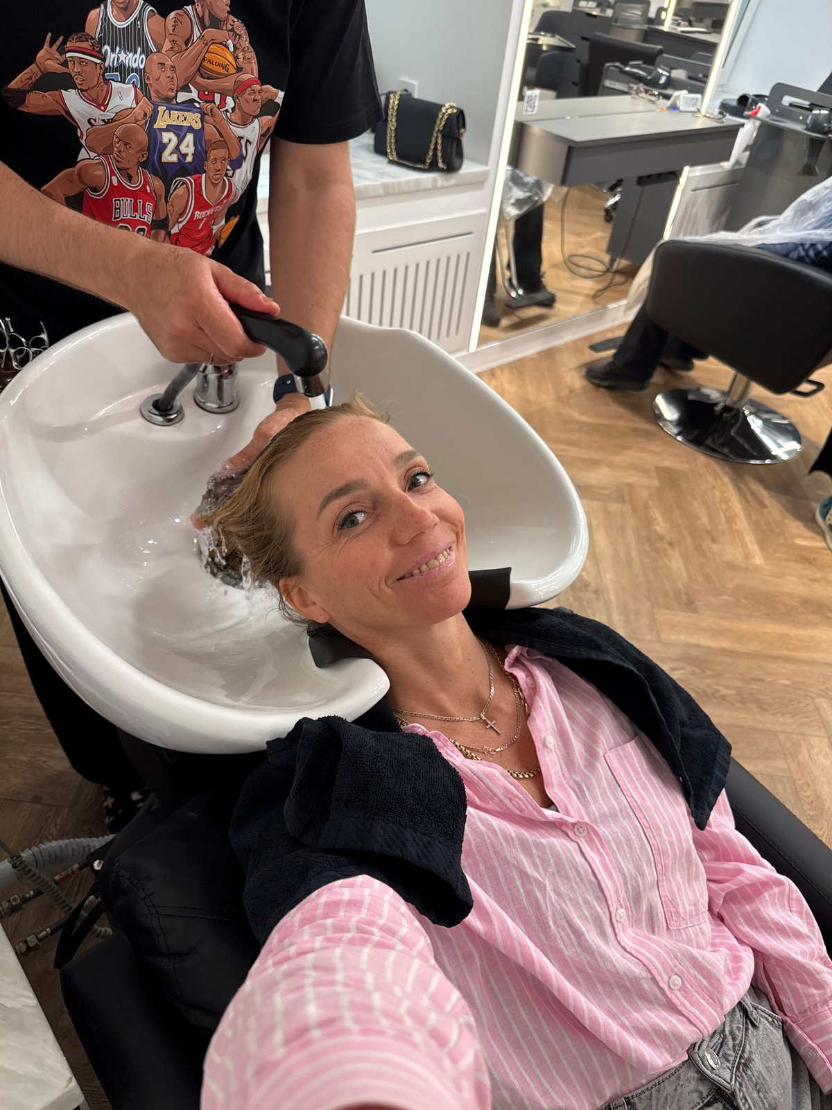Woman receives hair salon services in Saint Petersburg