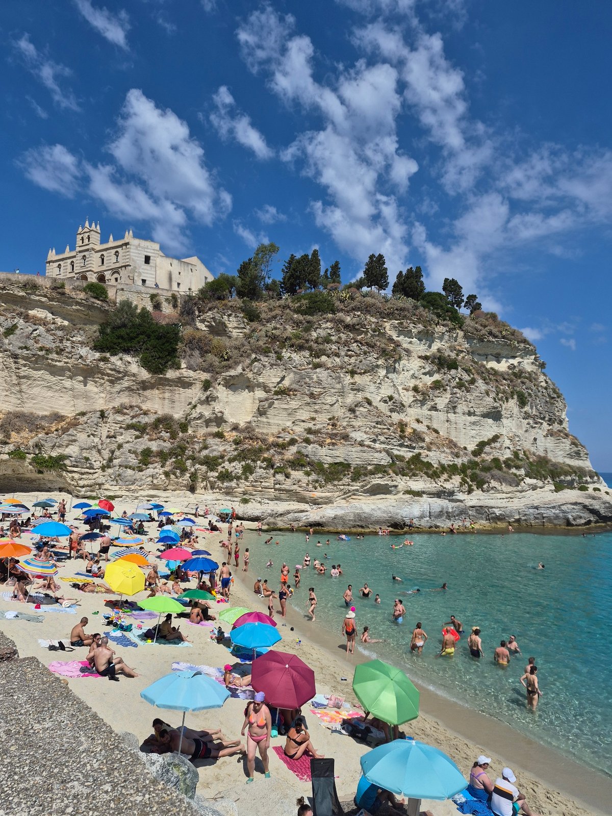 Tropea's beach, cliffs, and sanctuary on a sunny morning