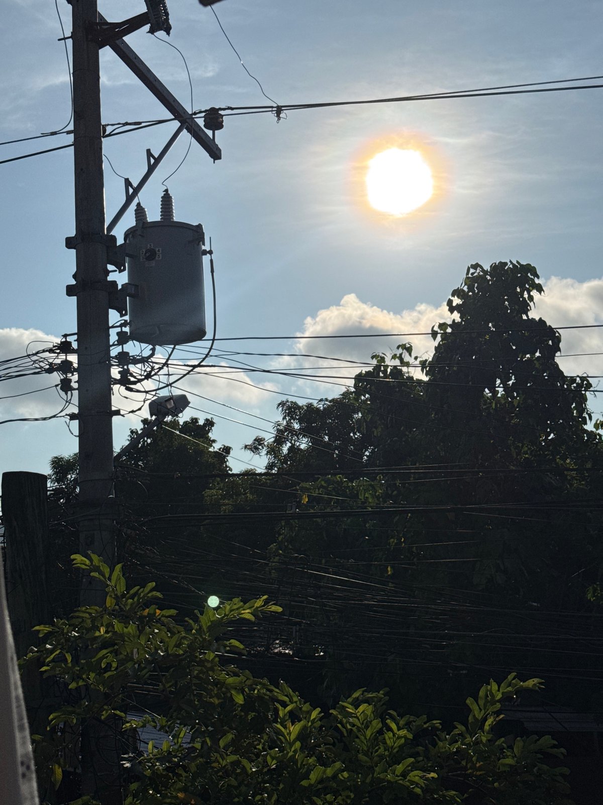 Davao City resident documents power lines and infrastructure during daylight
