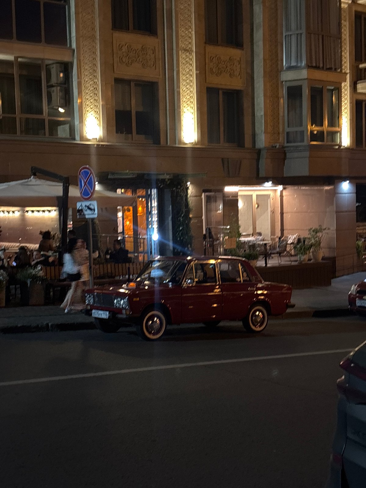 Kazan bar night, vintage car outside and bottle chandelier within