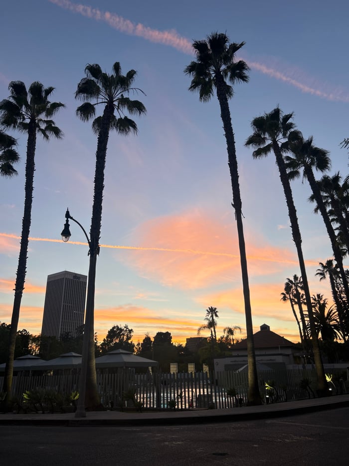 LA sunset and delivery robot captured during evening hours