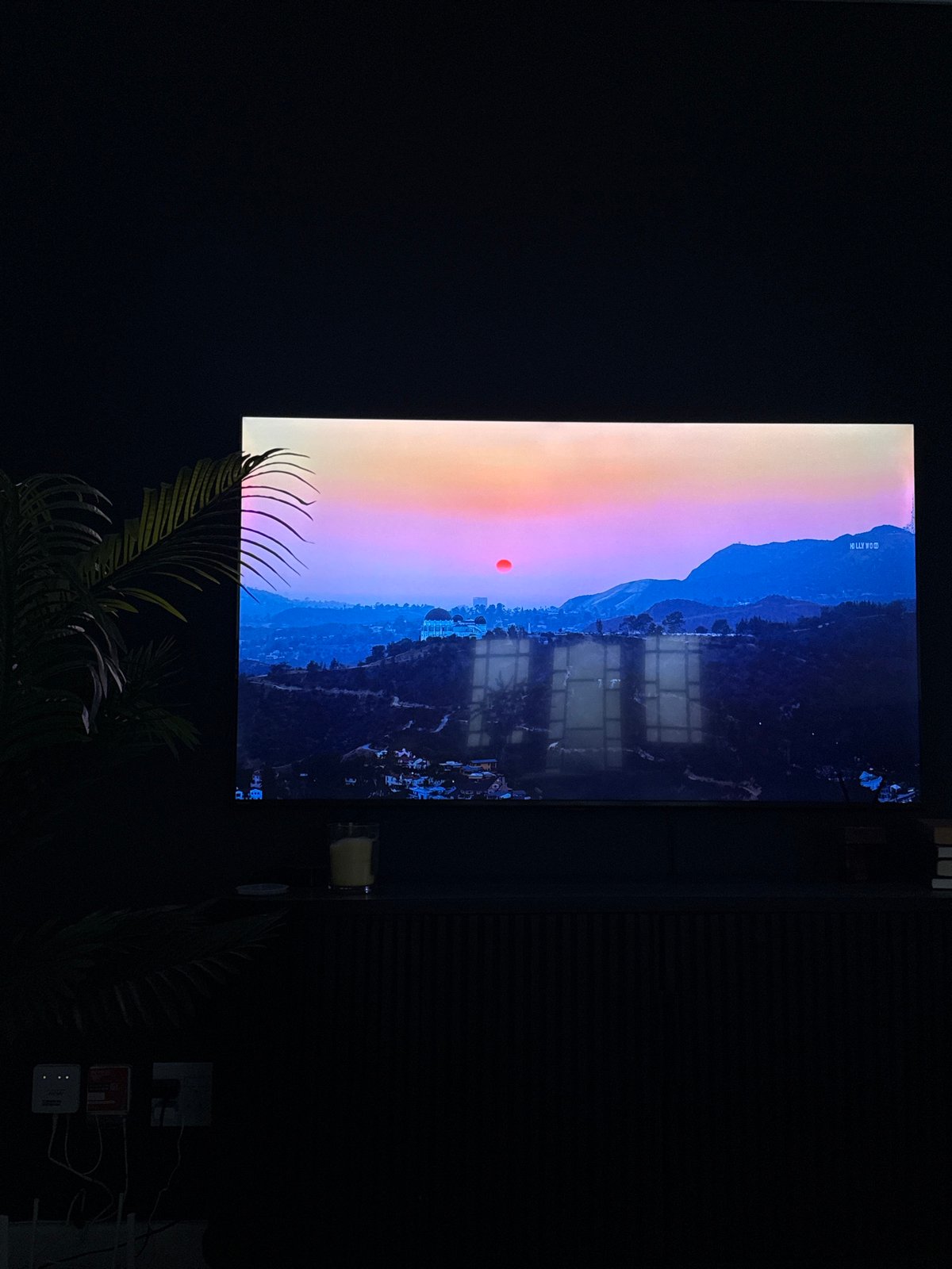Large vertical screen shows landscape scene in Cape Town