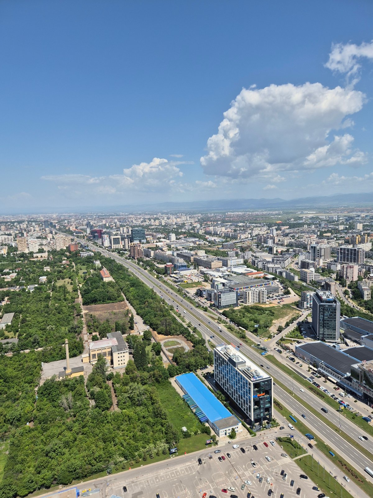 Aerial view captures Sofia cityscape with solar infrastructure