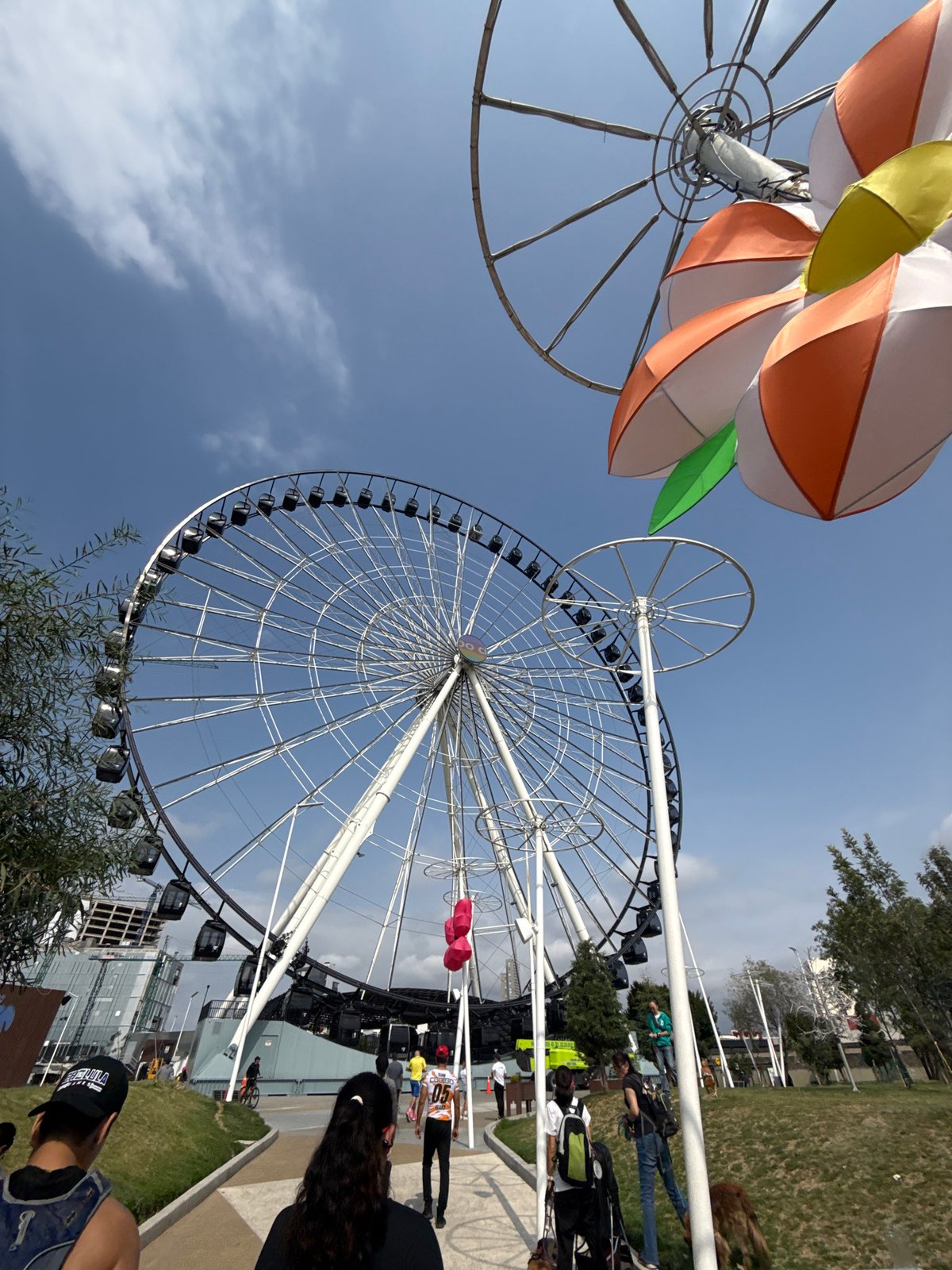 Weekend leisure activities captured near Puebla's iconic Ferris wheel