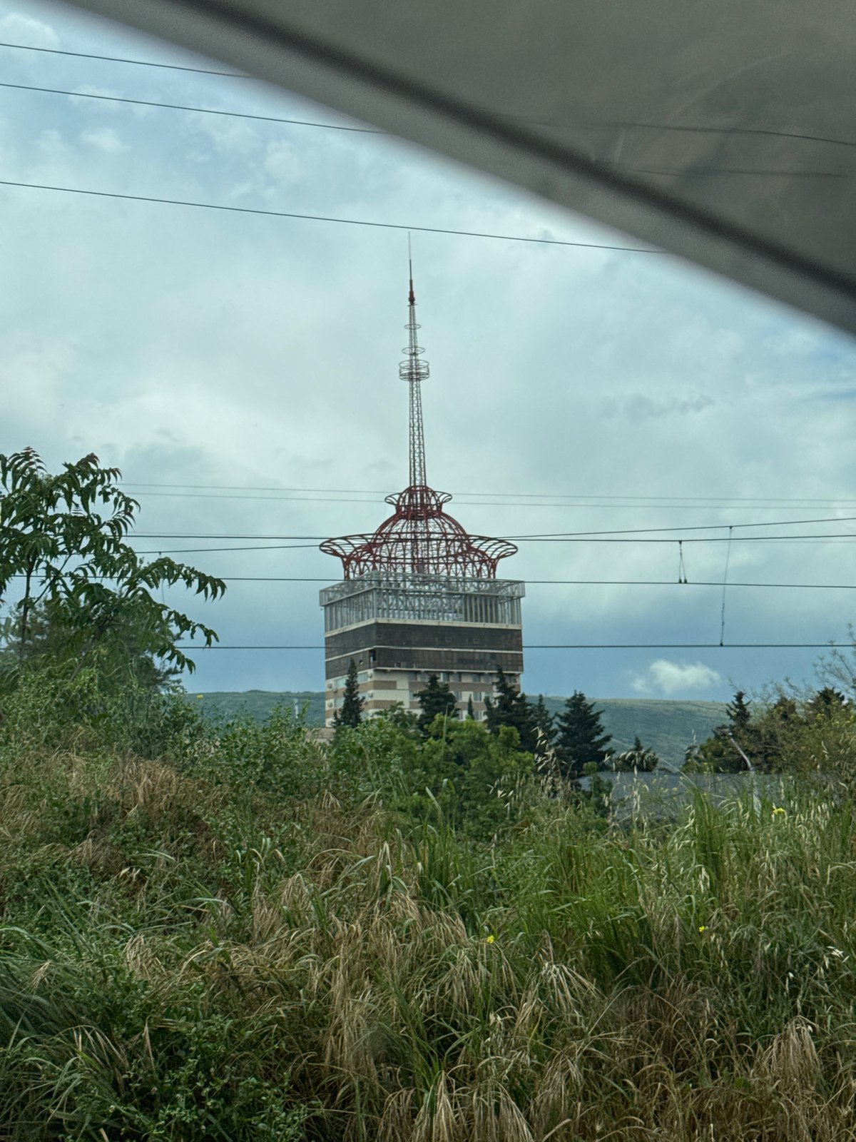 Morning views of Tbilisi landmarks and wet streets captured