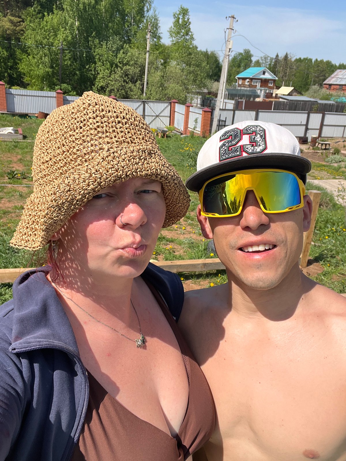 Couple takes cheerful outdoor selfie in Chaikovsky, Russia