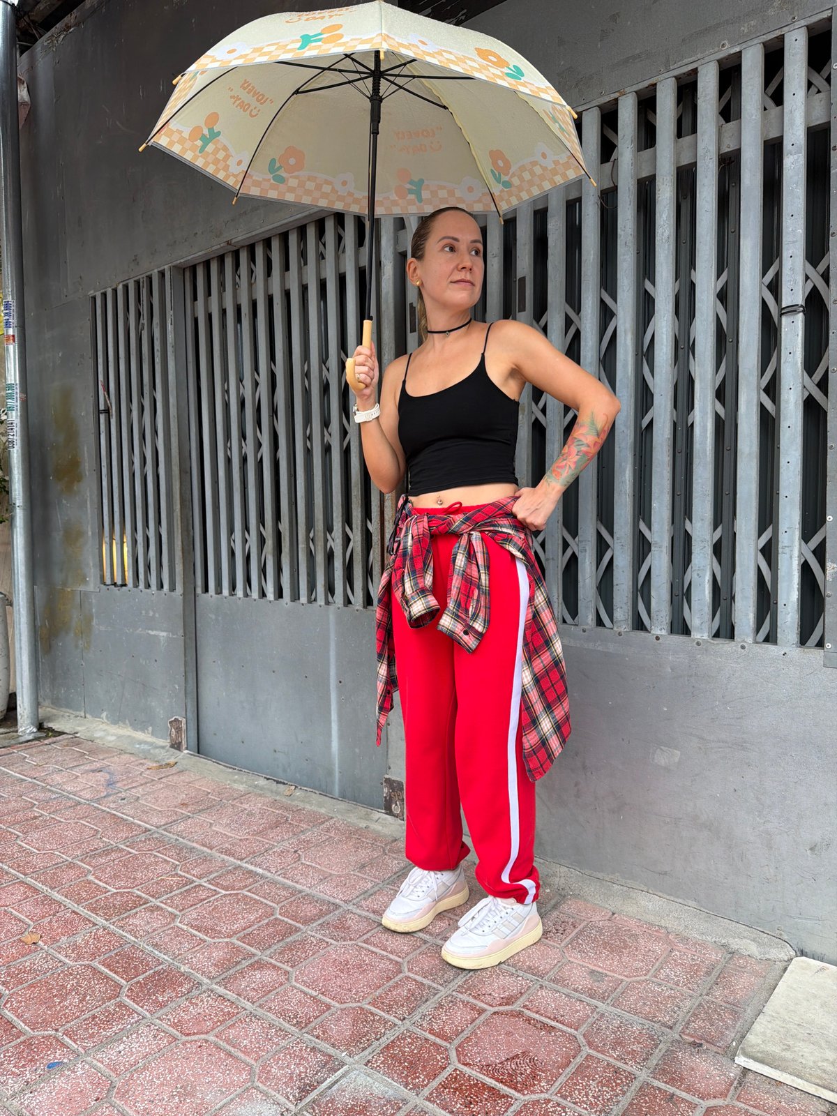 Rainy morning street life along Nha Trang's sidewalks