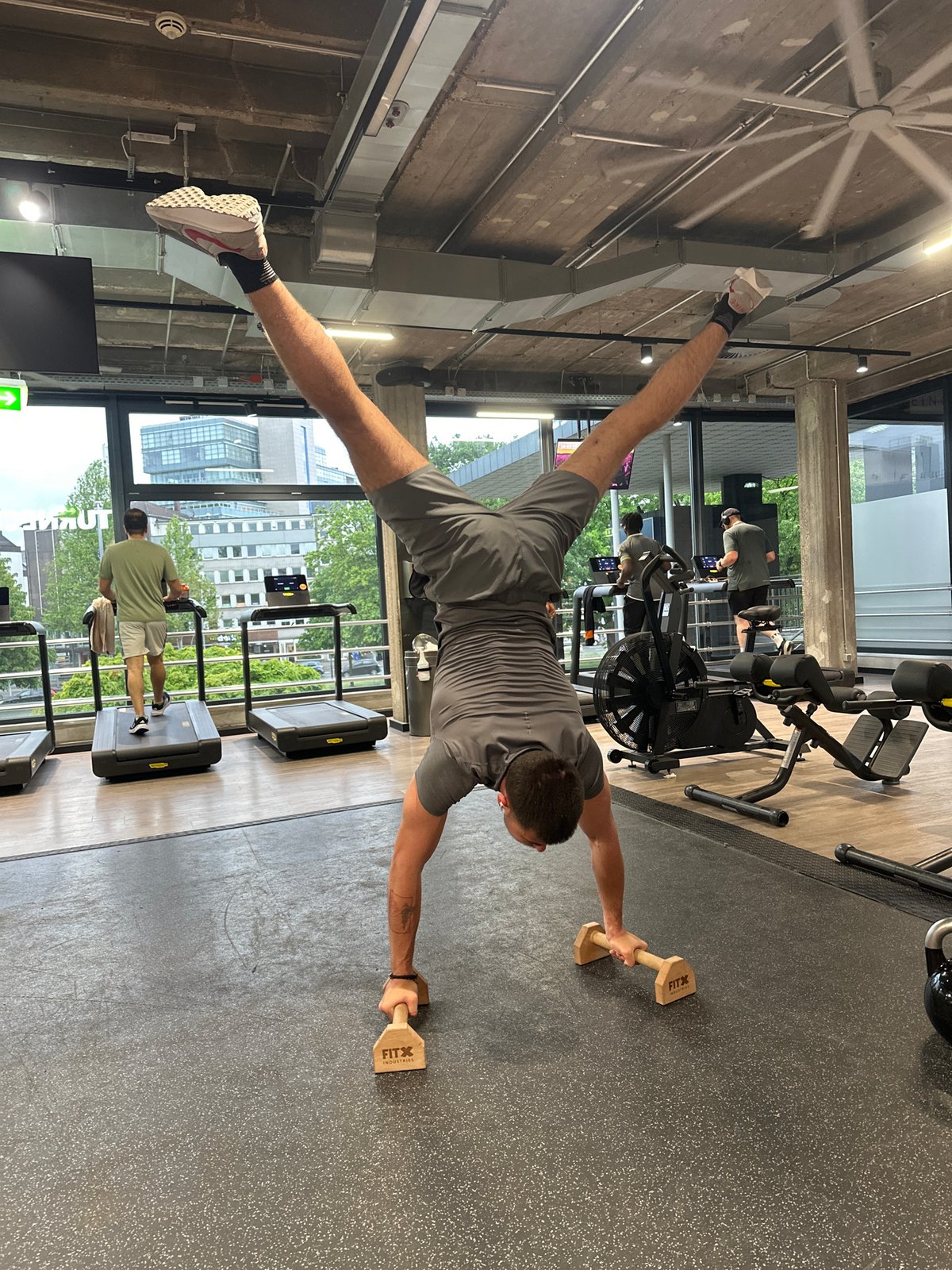 Gymnast performs handstand routine at Essen gym