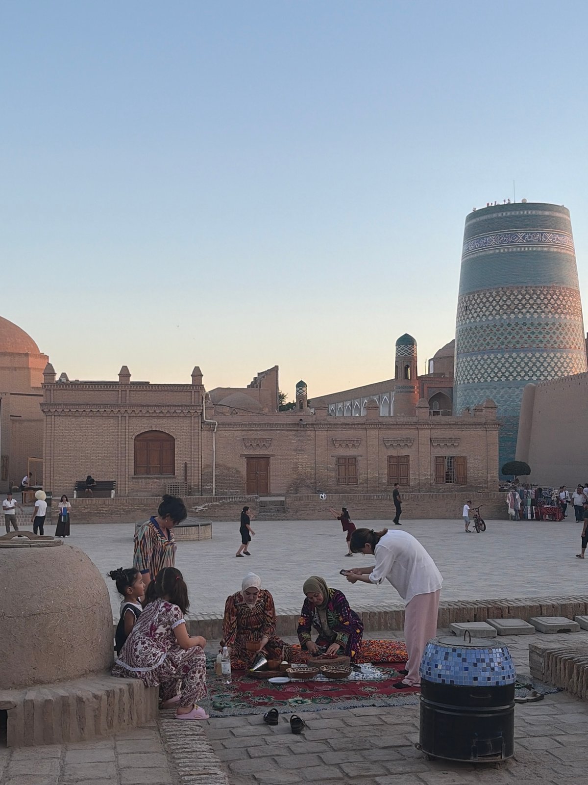 Afternoon tourism and daily life captured in historic Khiva