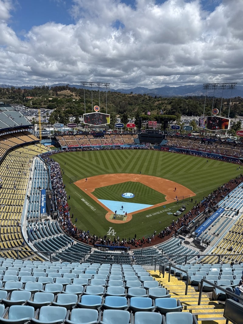 Dodger Stadium game day captured alongside local commemorative mural