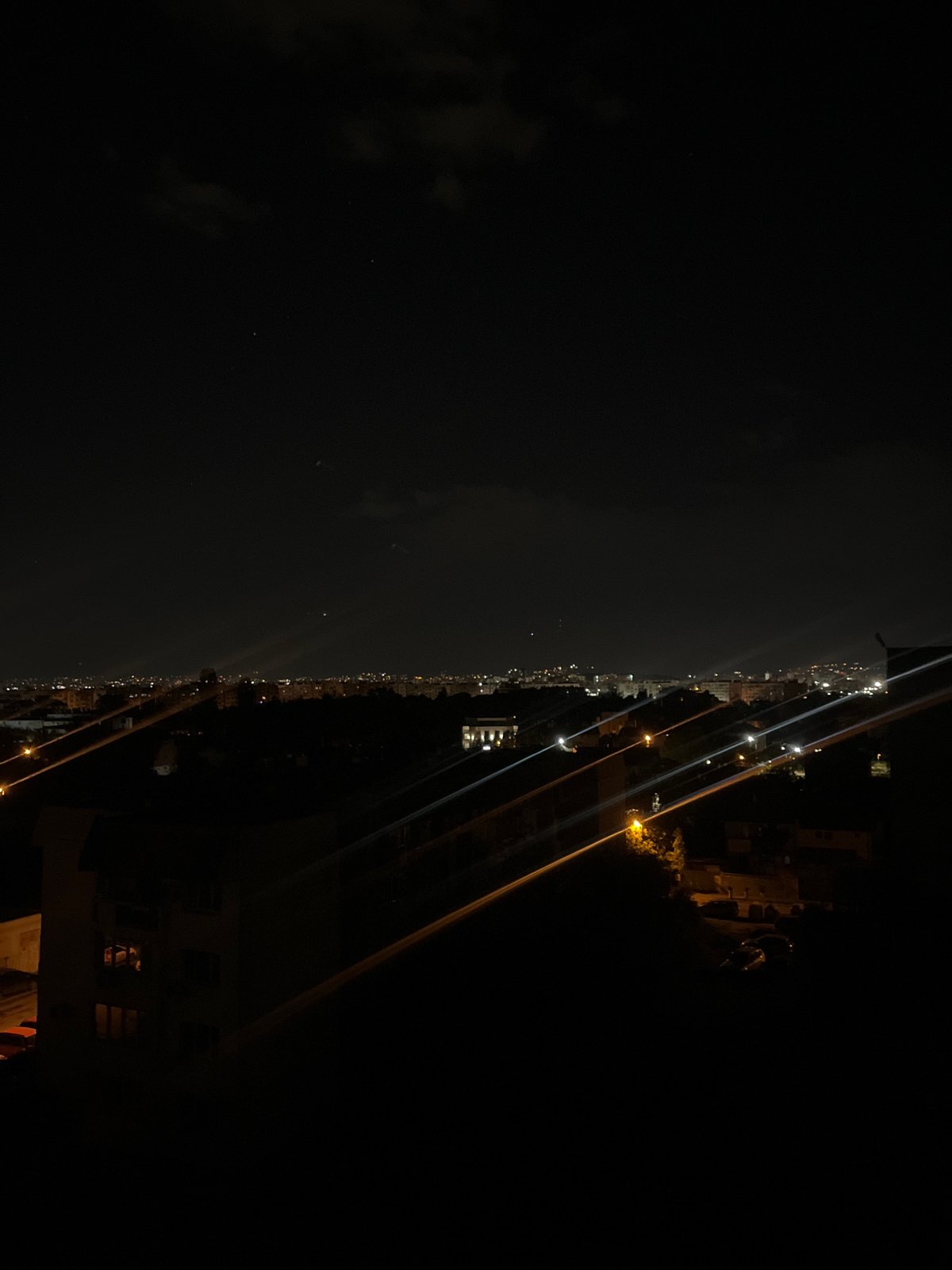 Nighttime cityscape photographs captured in Sofia, Bulgaria from elevated position