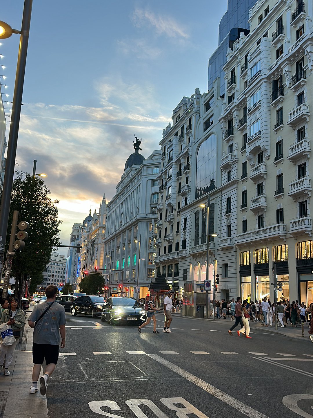 Evening street scenes captured from elevated Madrid thoroughfare
