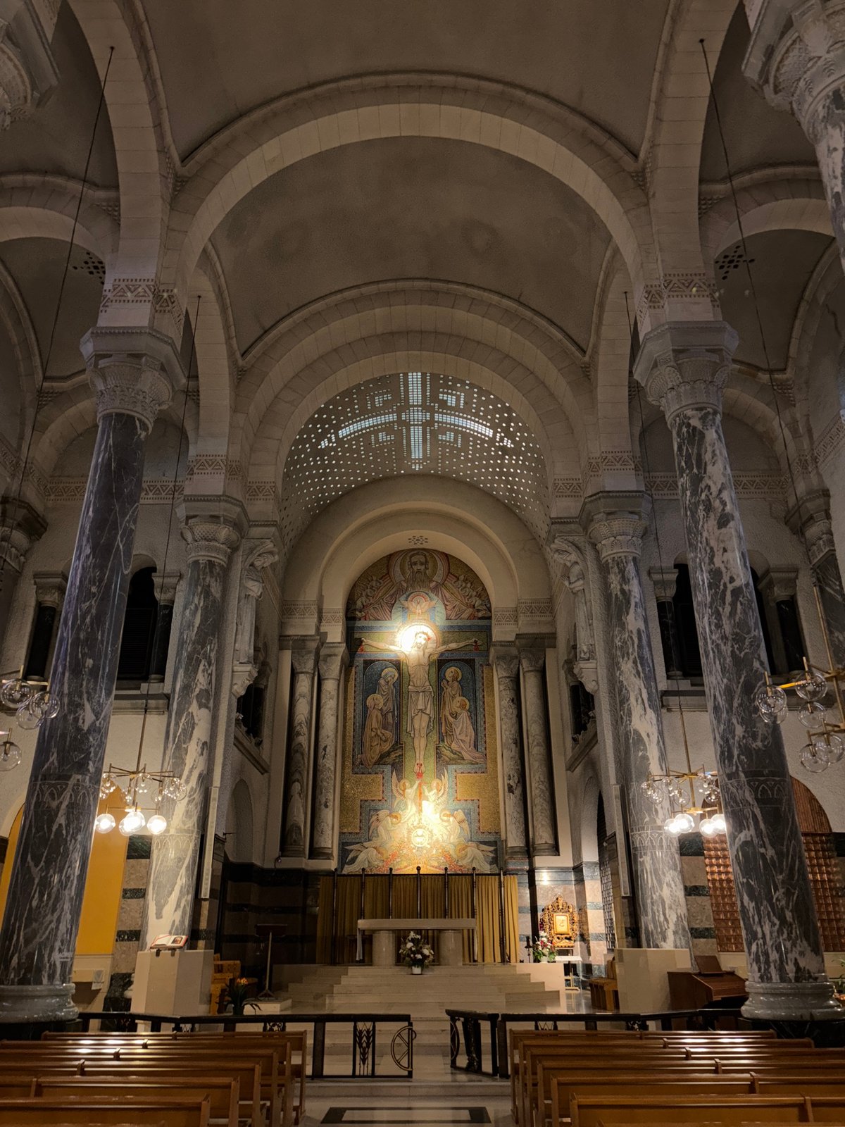 Tourist documents Annecy basilica and city views on cloudy day