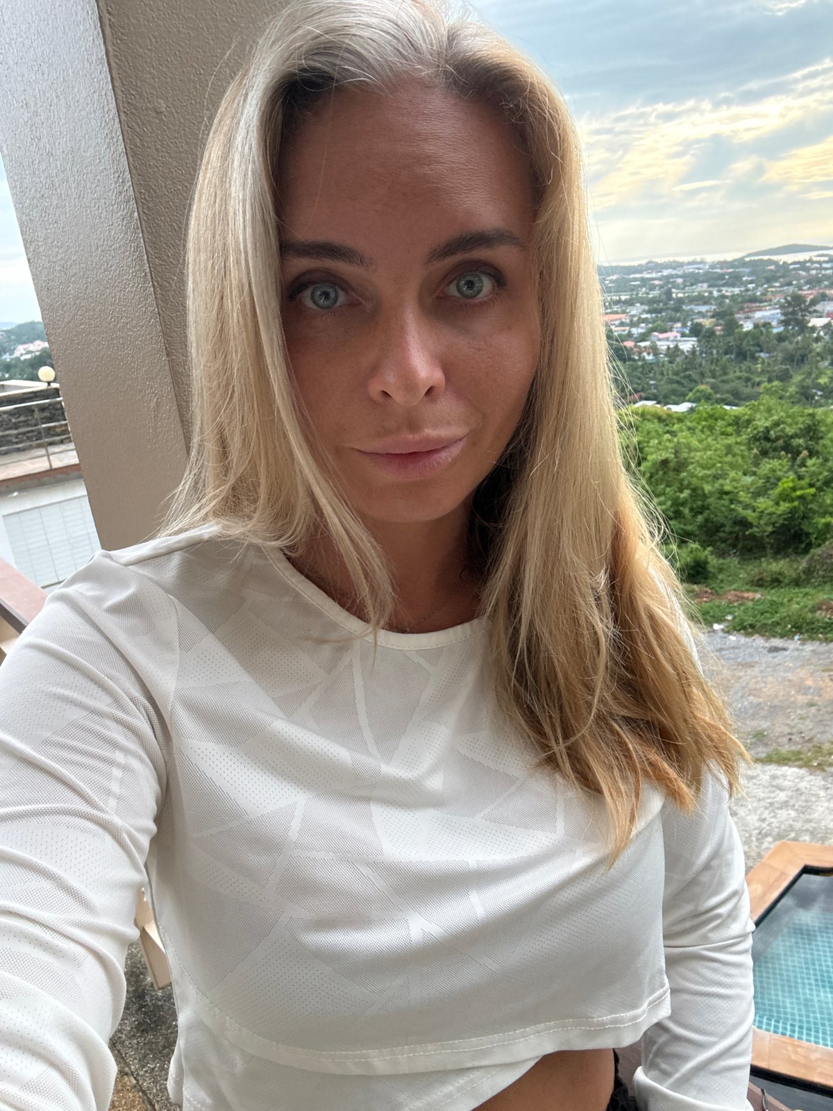 Hilltop views over Ko Samui's coastal town on a cloudy day