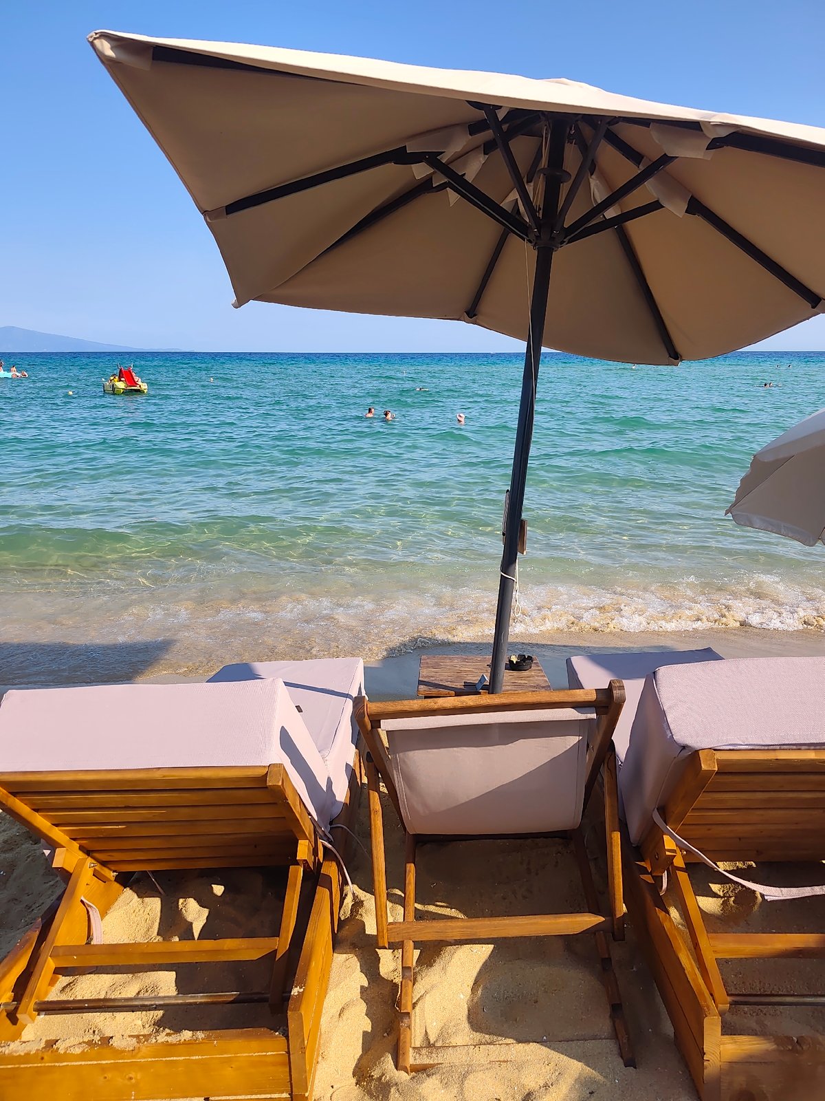 Lazy afternoon at a beach club in Nea Peramos, Greece