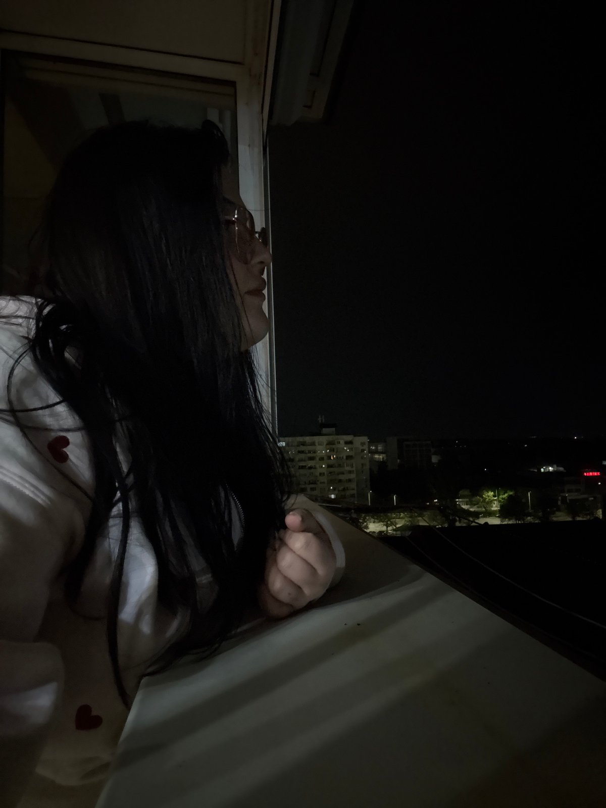 Woman spotted at window during nighttime in Sofia