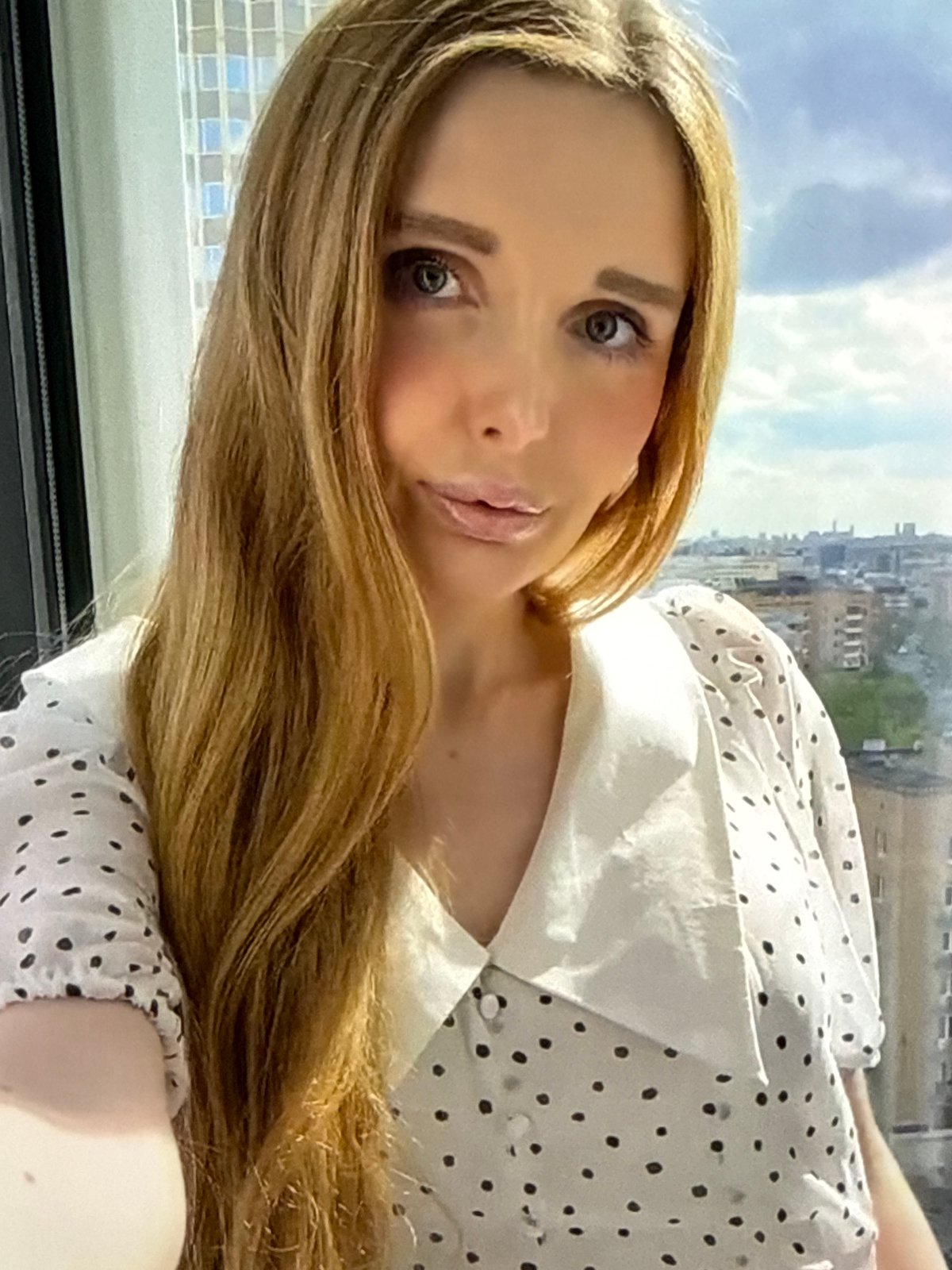 Selfie session across two outfits, bathroom and window settings