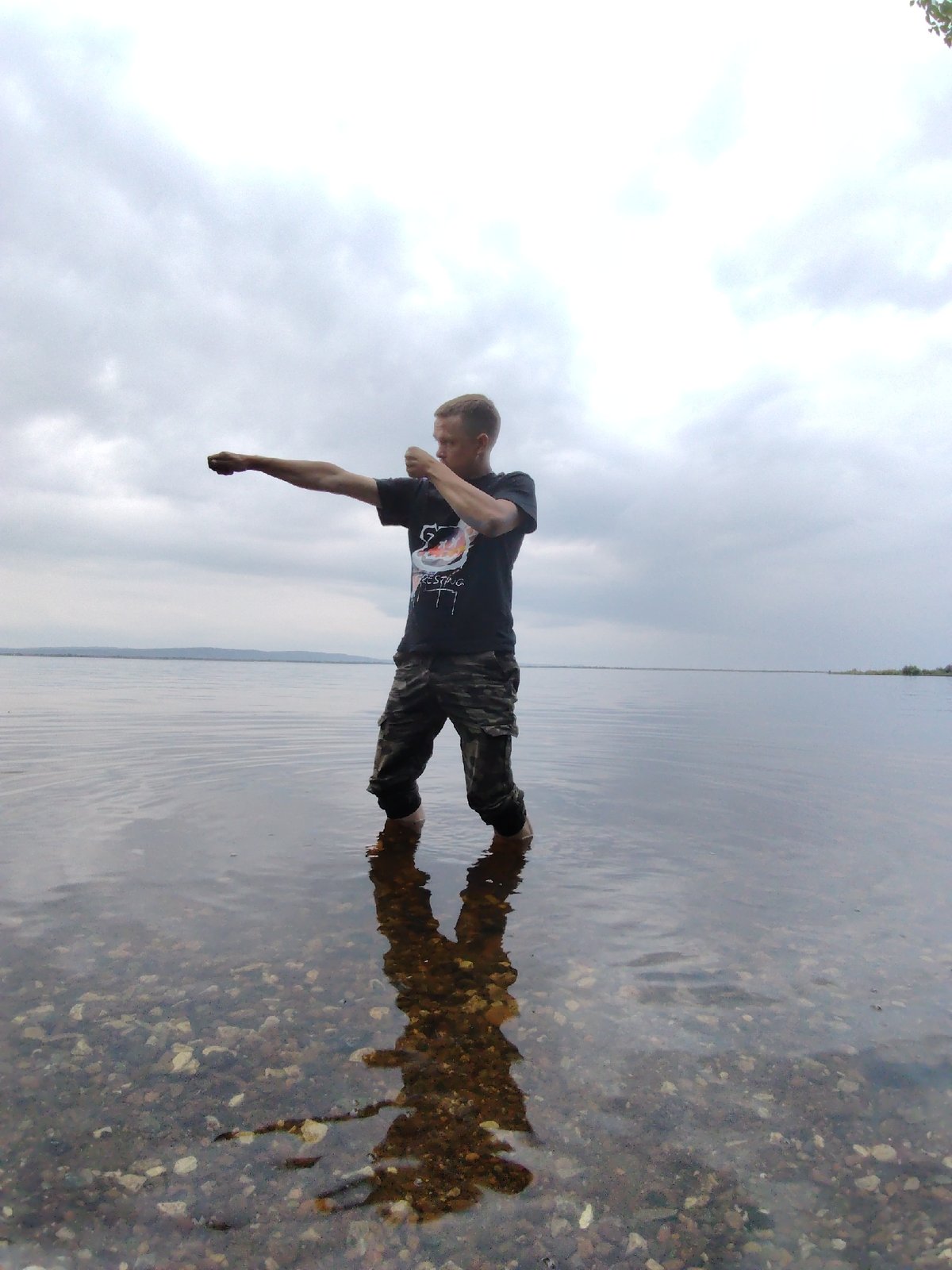Playful afternoon in the shallows — bikes, bubbles, and martial arts