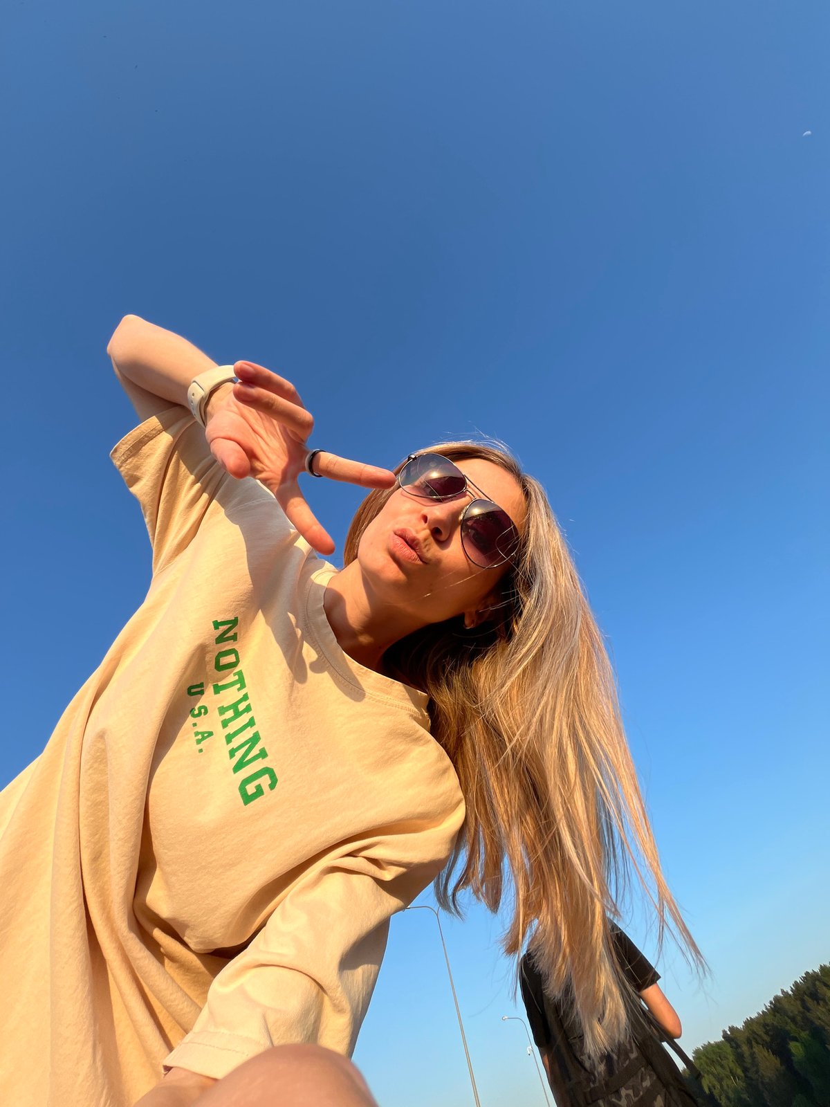 Young women document sunny afternoon outing in Chaikovsky, Russia