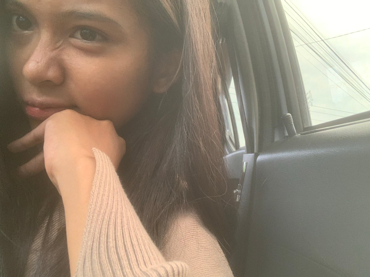 Woman takes car selfies in Sungai Meriam, Indonesia