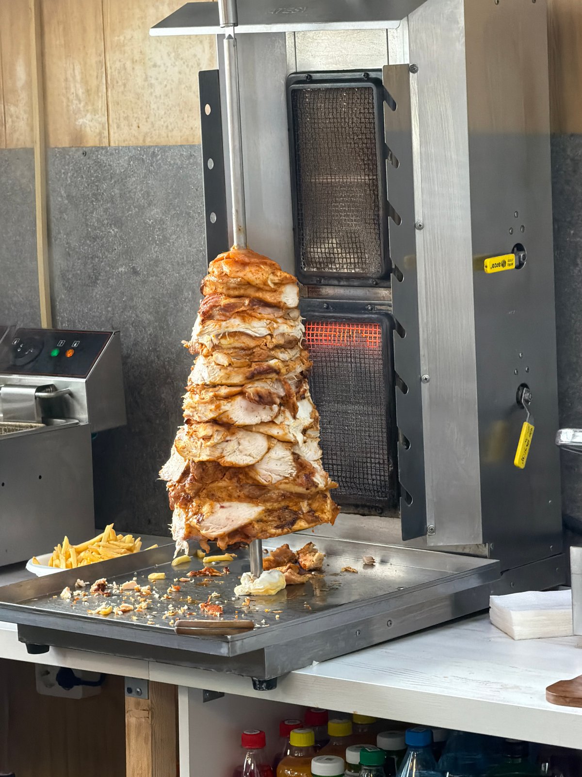 Rotisserie kebab preparation observed in Krasnoyarsk restaurant