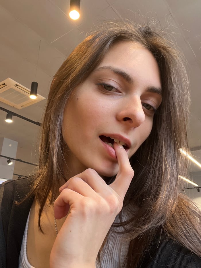 Woman takes morning selfies in Krasnoyarsk retail locations