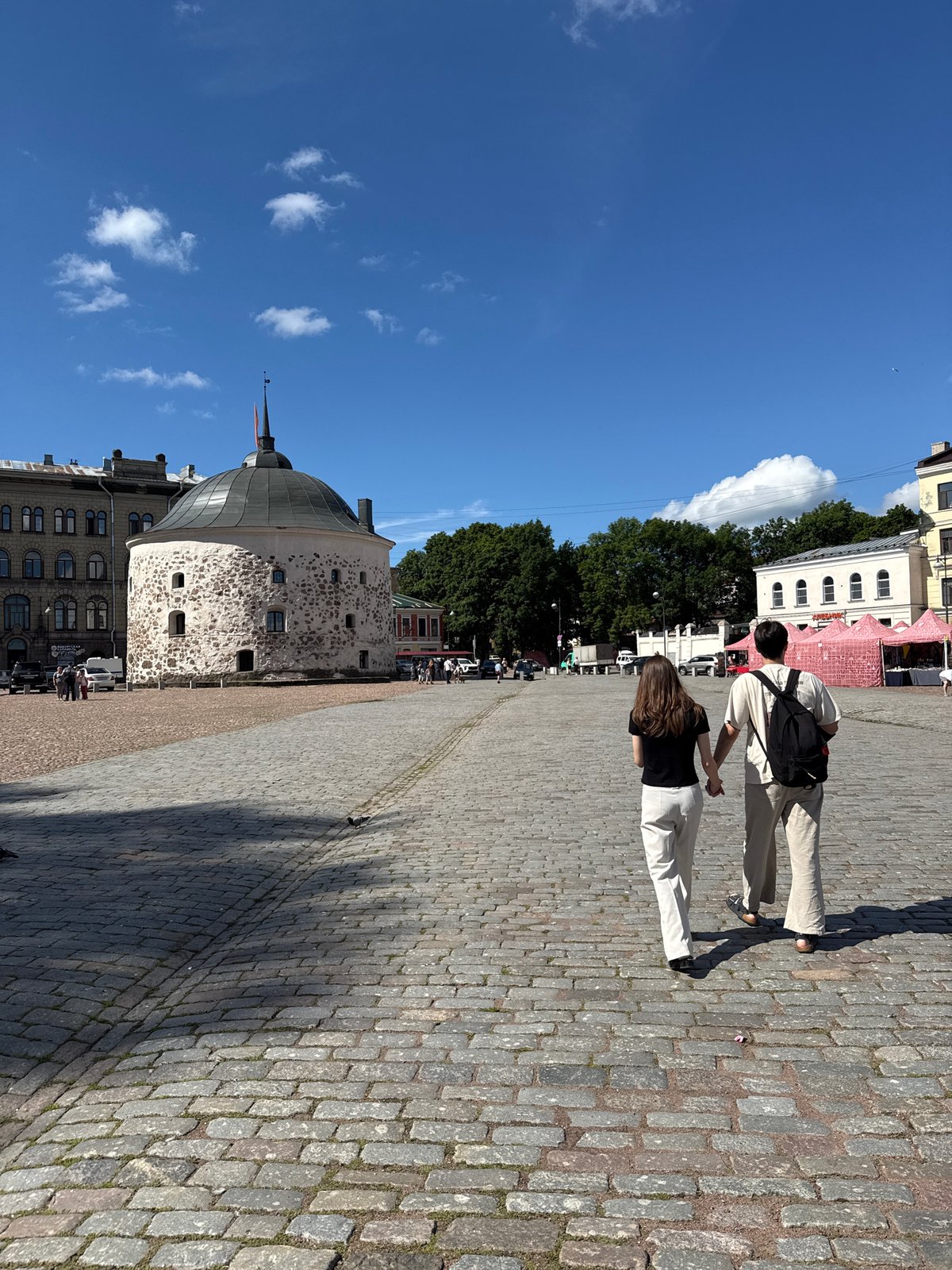 Exploring Vyborg's historic streets and architecture on a summer morning