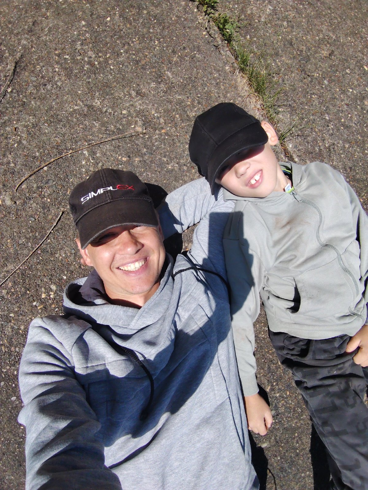 Father and child enjoy successful fishing trip in Chaikovsky