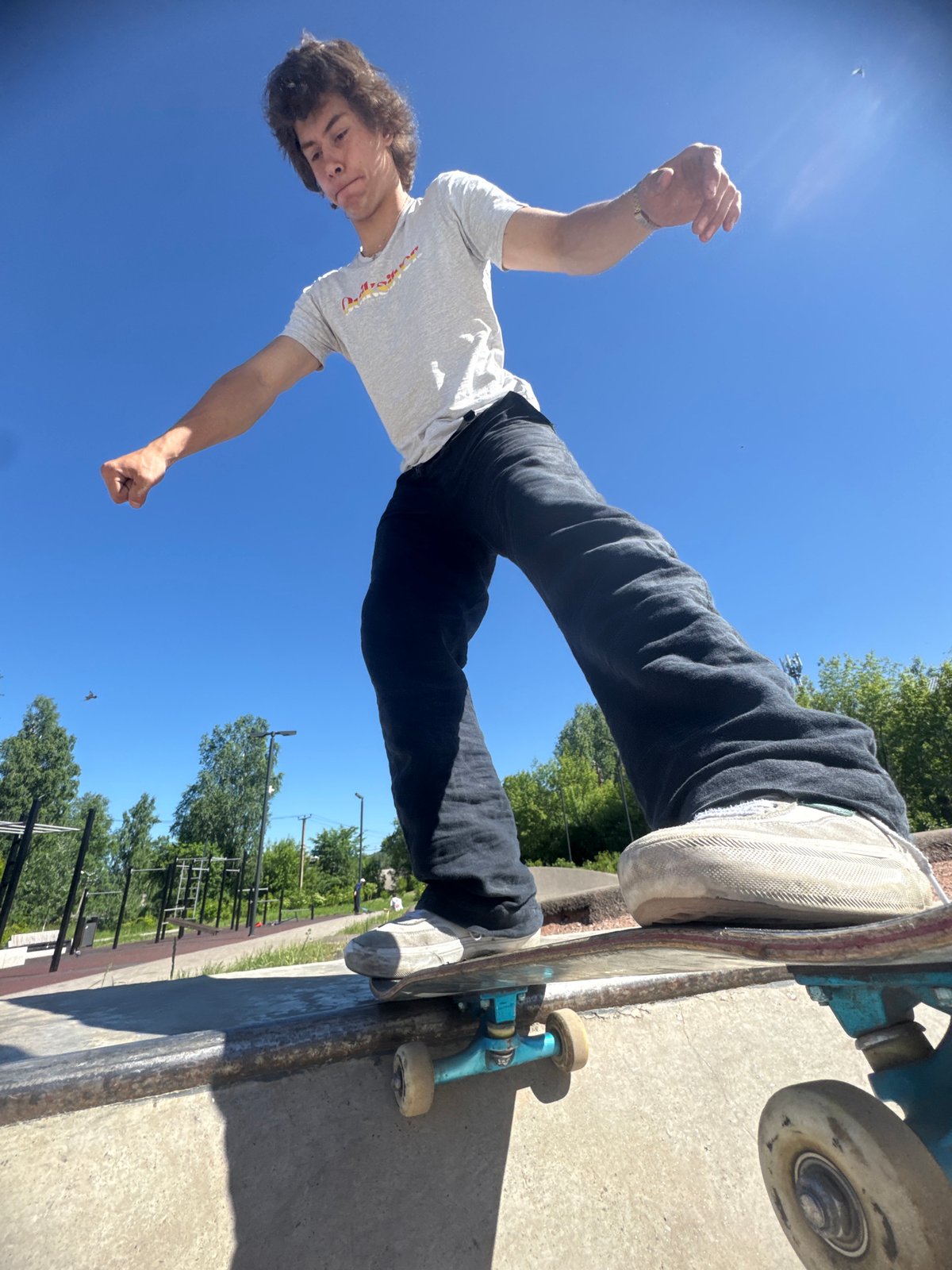 Skateboarding session at an outdoor skatepark in Divnogorsk