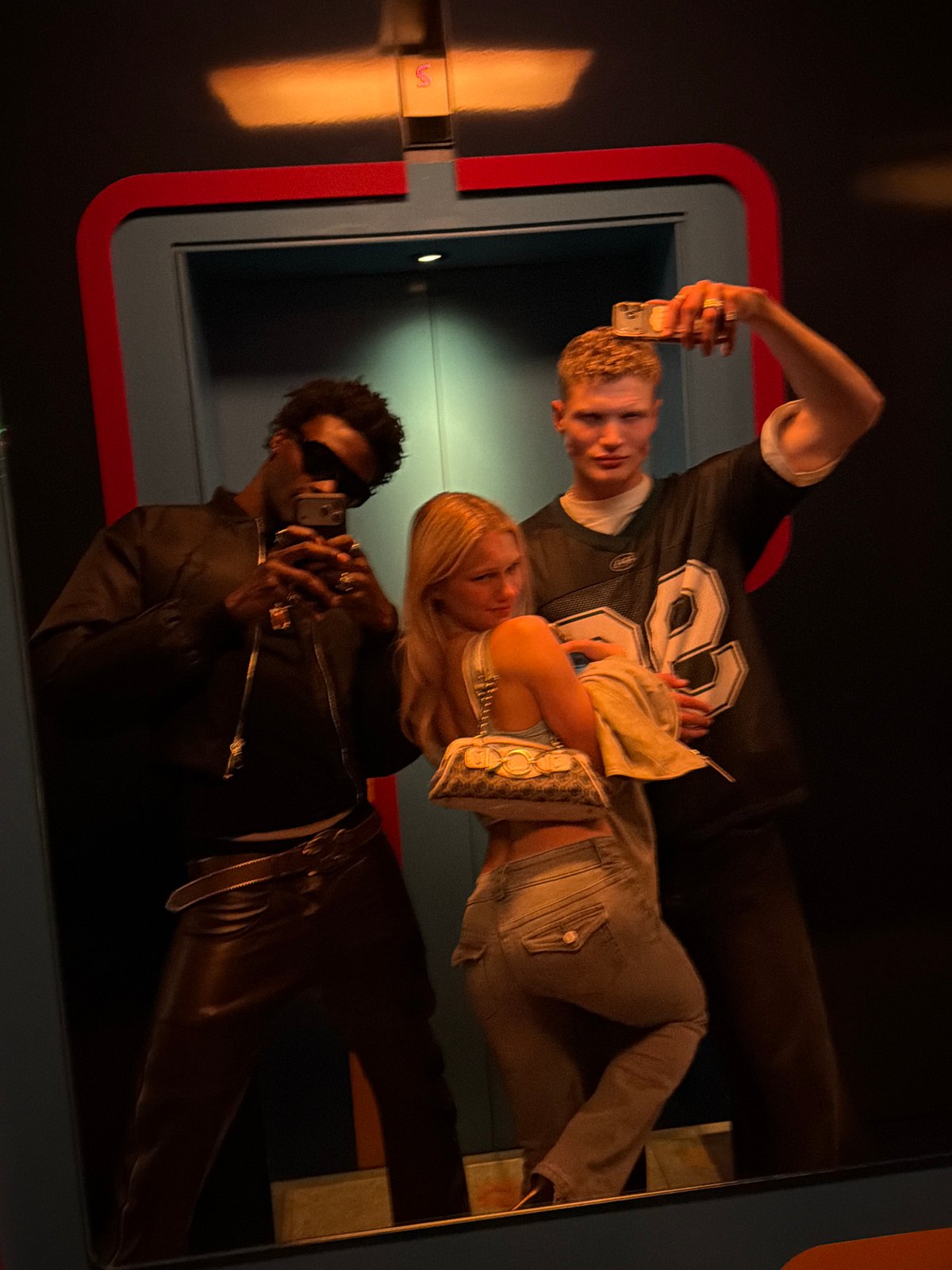 Late-night selfie session in London elevator captured by witness