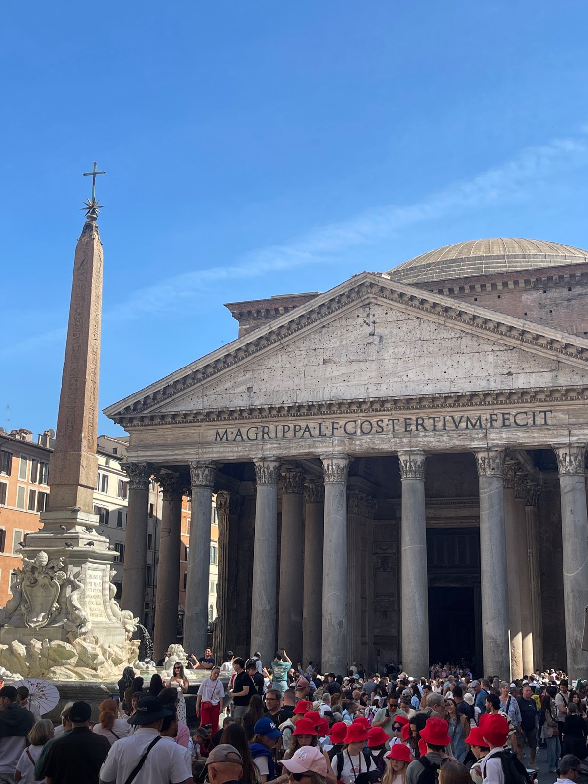 Tourists visit Pantheon and baroque church in Rome