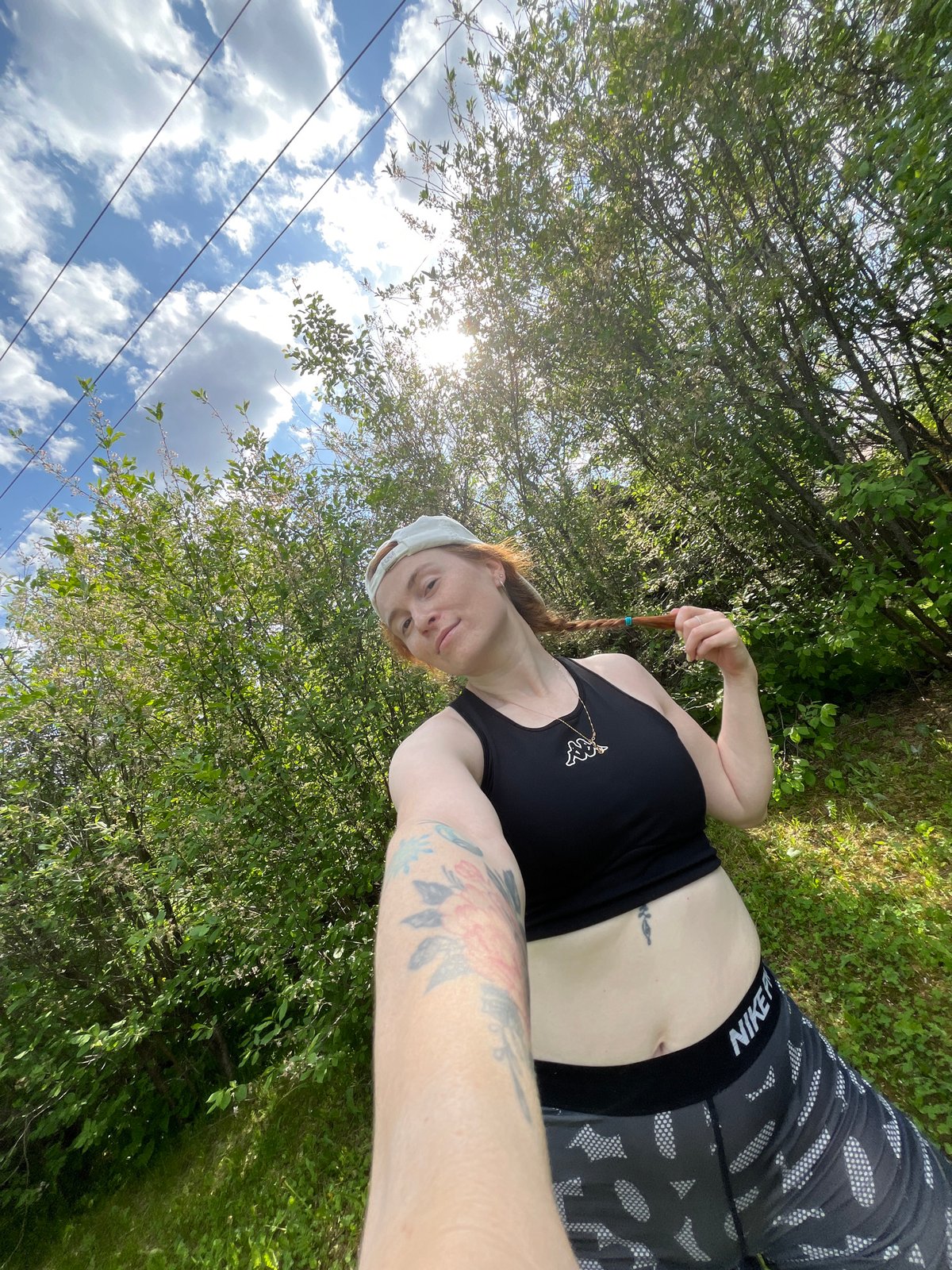 Woman takes outdoor selfies in Chaikovsky park area