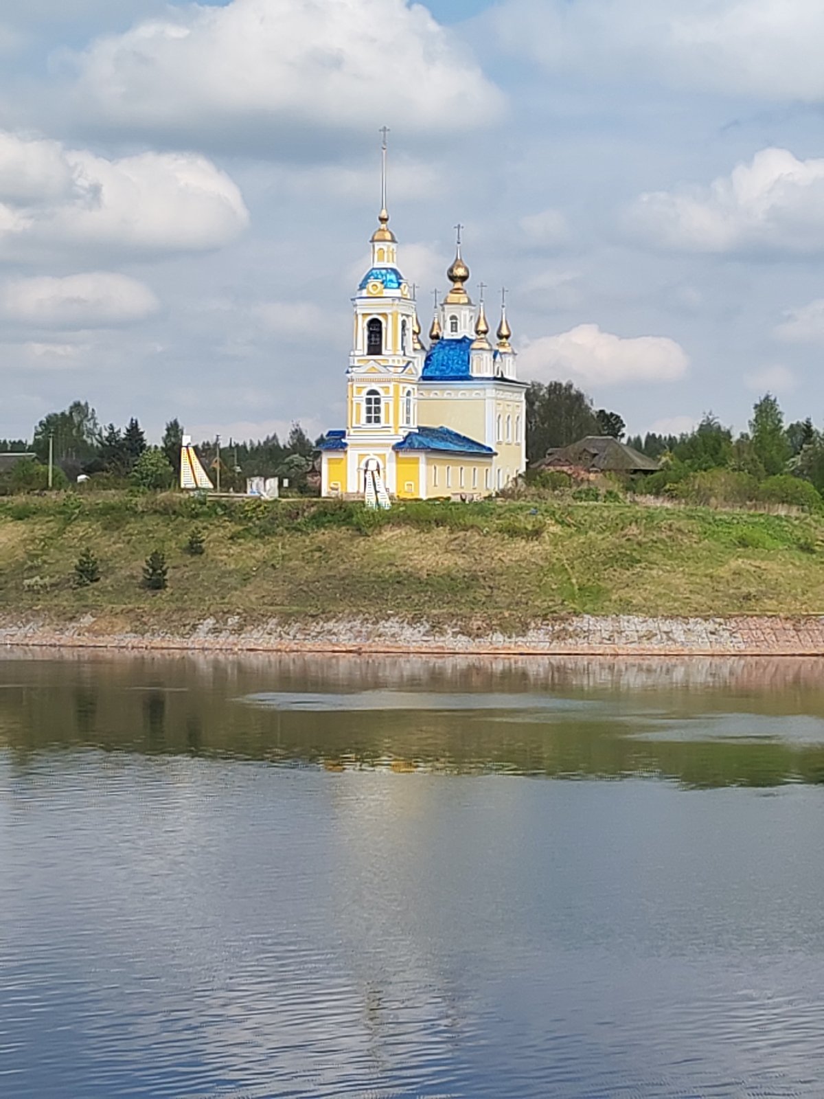Orthodox church with golden domes observed in Глебово, Russia