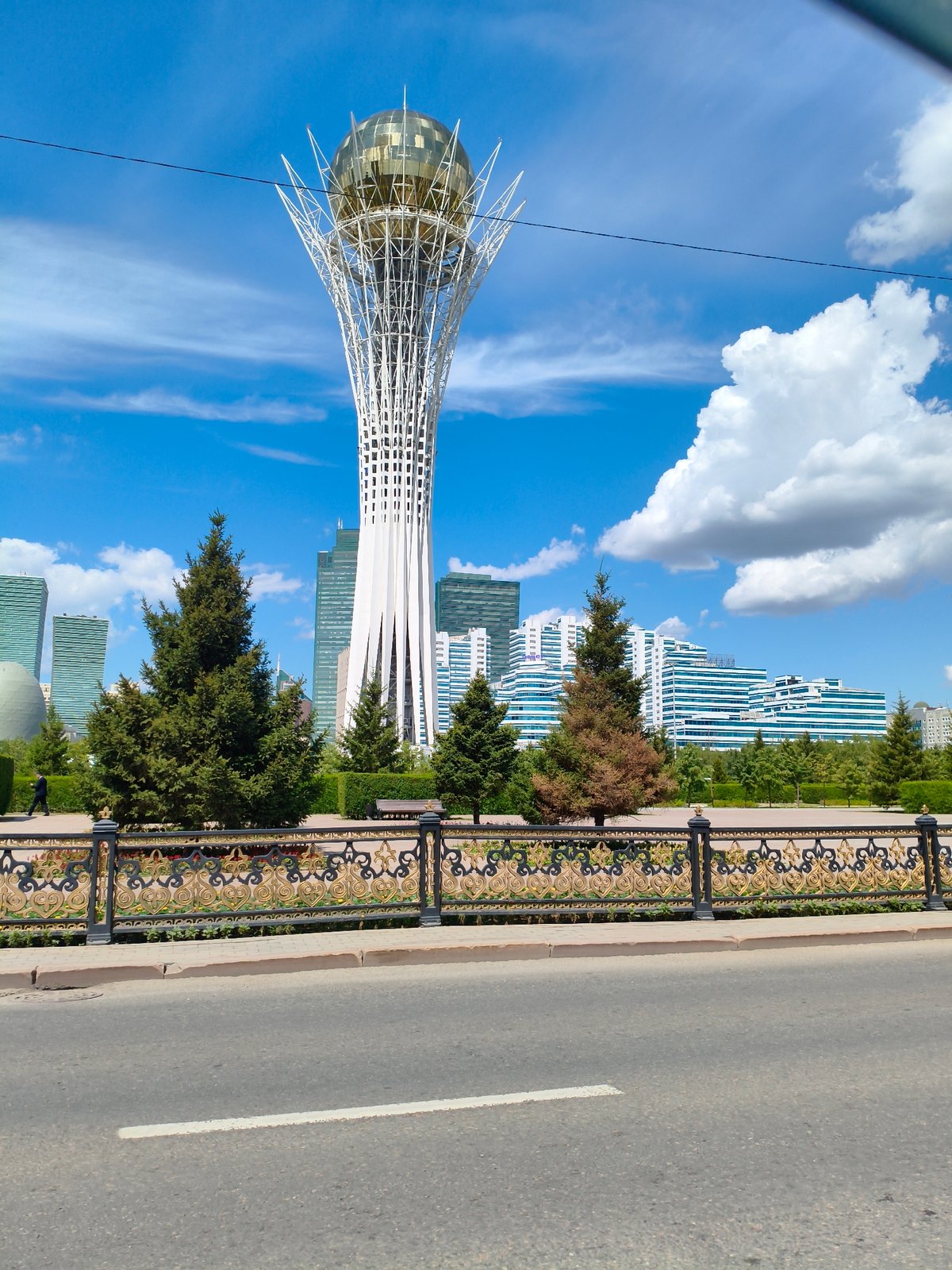 Astana landmarks: Bayterek Tower and glass telecom building