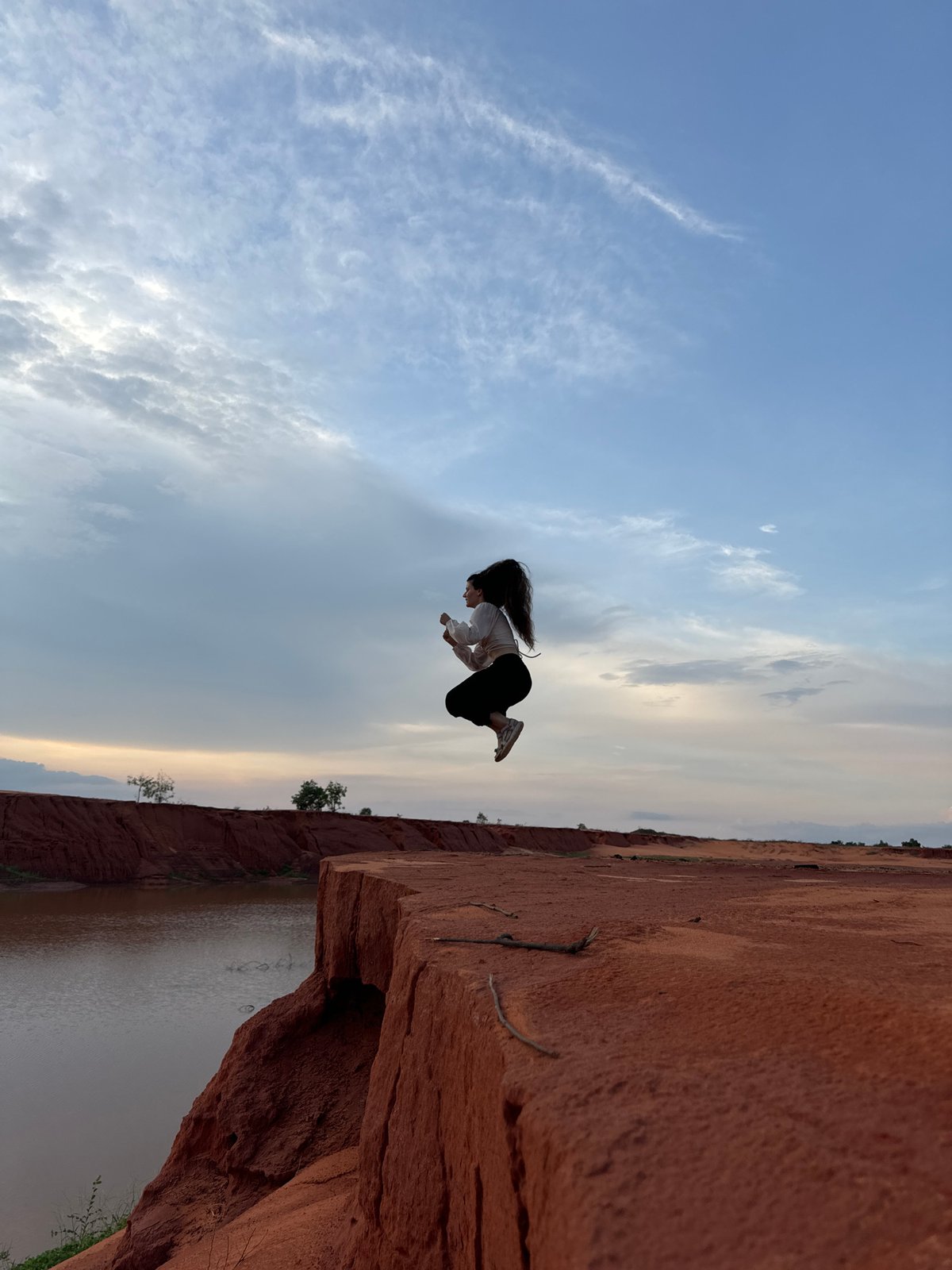Tourist photo session captured at Mui Ne's red cliffs