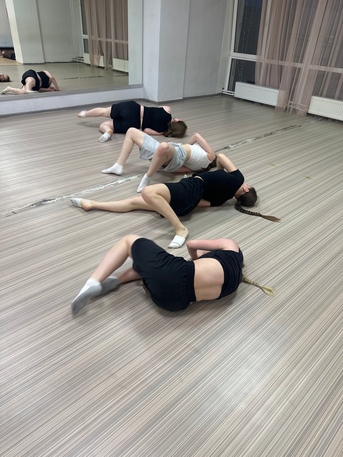 Young dancers practice floor routines at Votkinsk studio