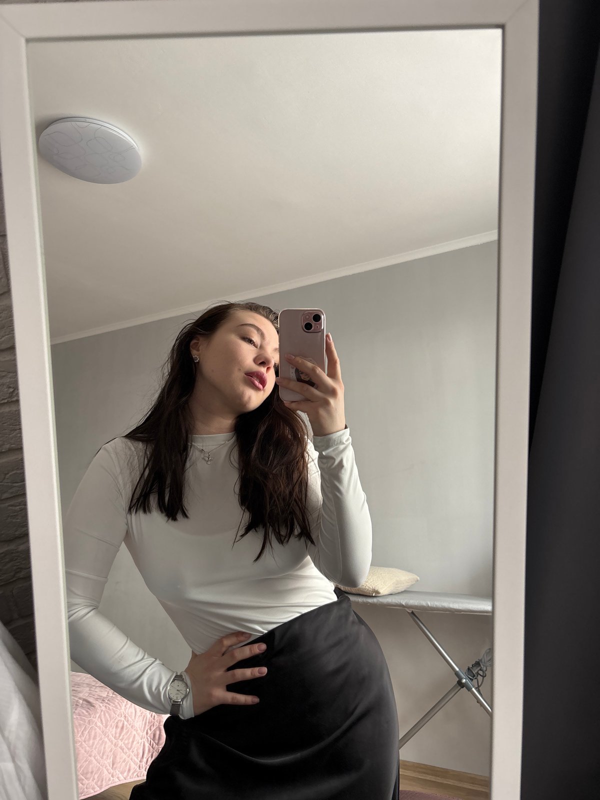 Woman documents quiet morning moments with selfies and pet