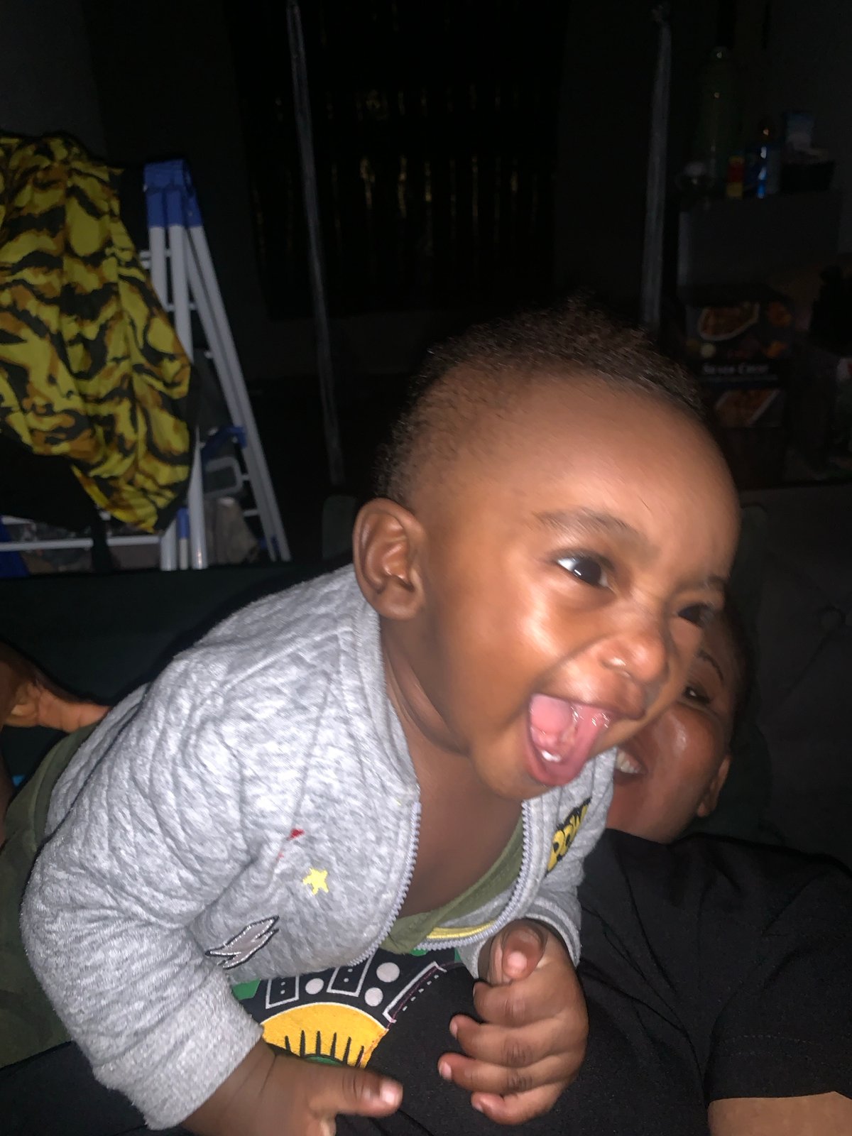 Playful candid moments with a child at home in Nigeria