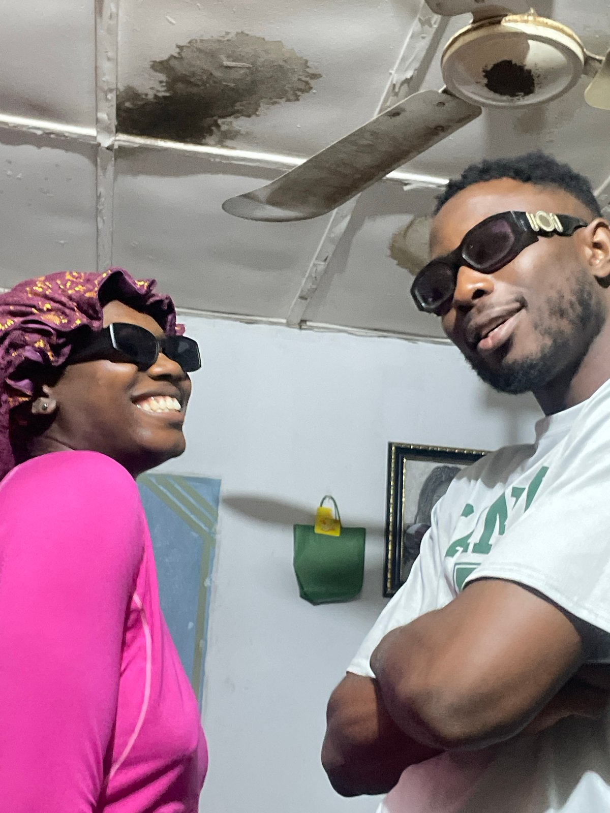 Late-night hangout in a Jos bedroom, drinks and selfies
