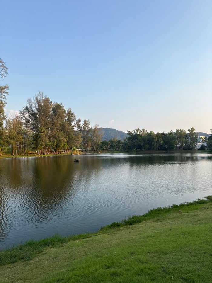 Woman photographed at lakeside locations in Choeng Thale, Thailand