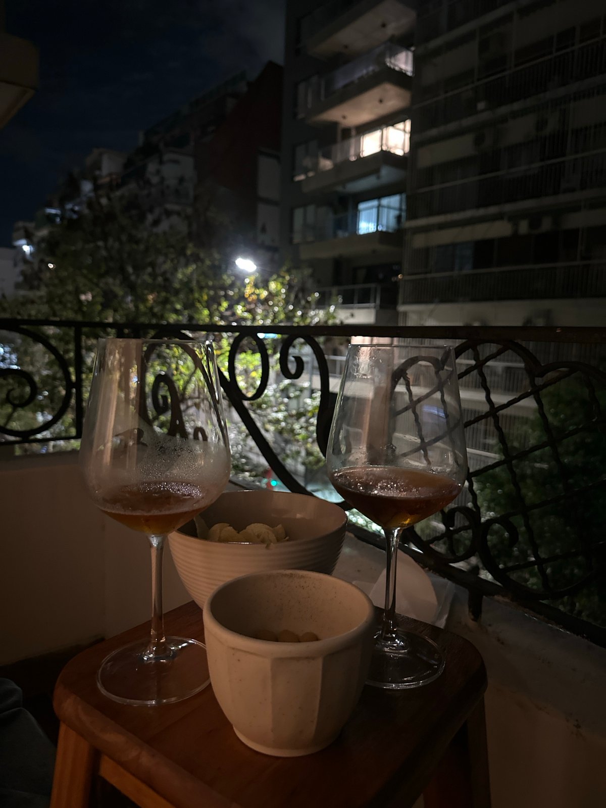 Late night drinks observed on Buenos Aires balcony