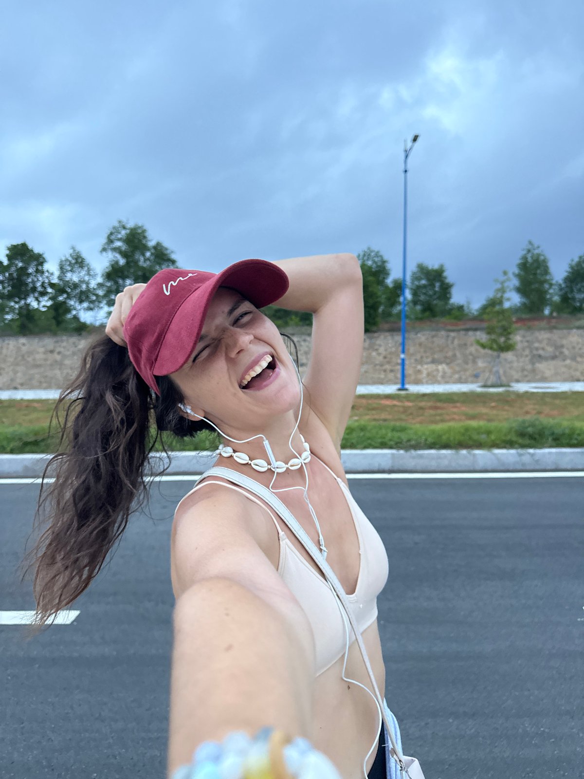 Selfie session on a quiet Mui Ne road on a grey morning