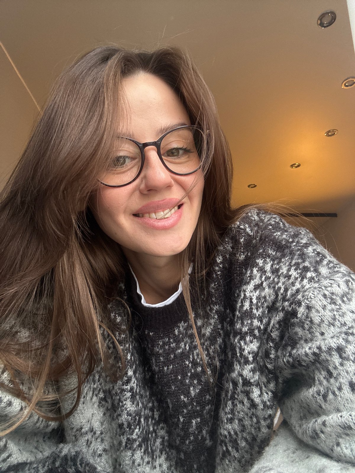 Woman photographed multiple times indoors in Krasnoyarsk